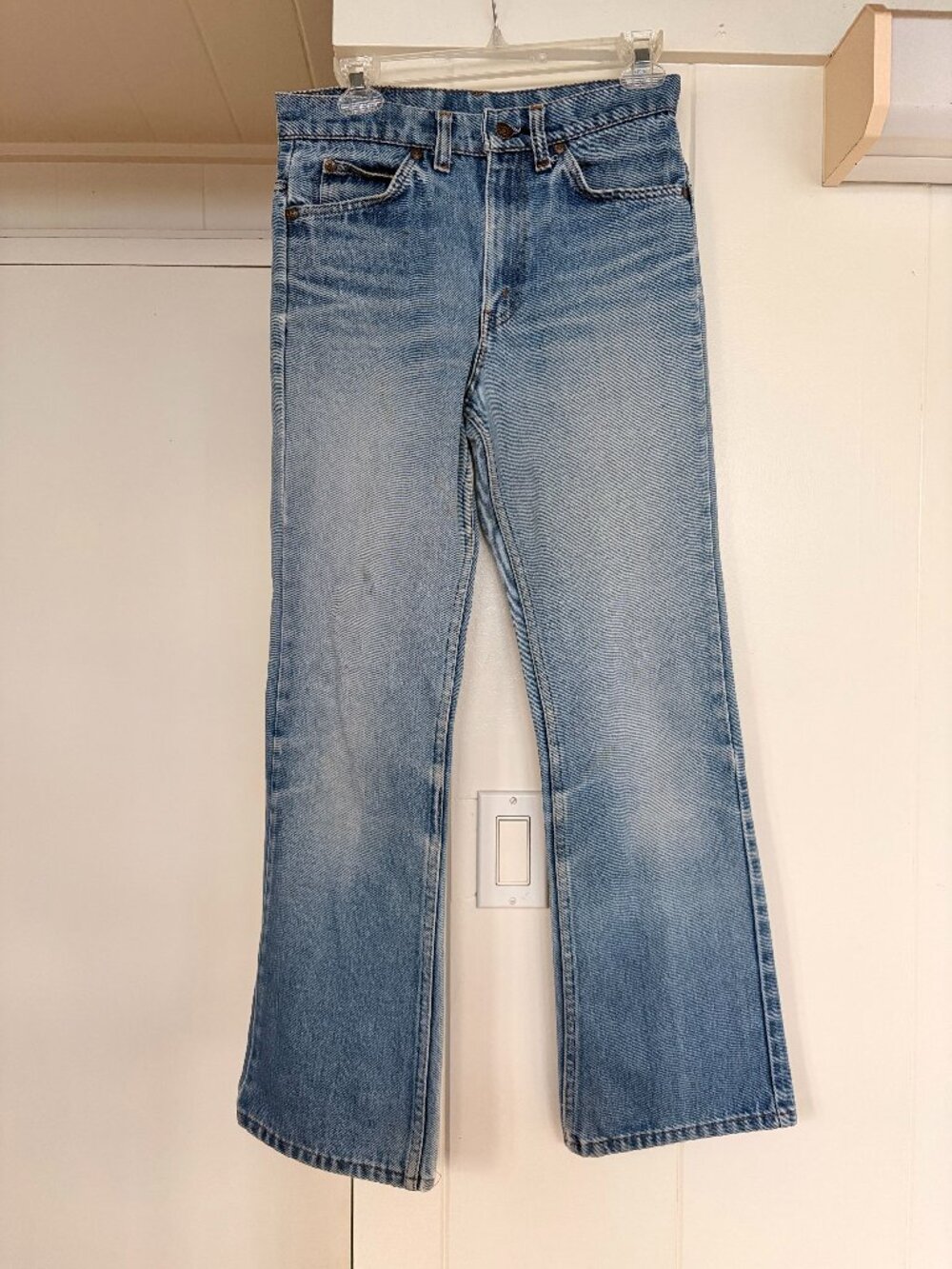 Vintage blue jeans with slight bell bottom